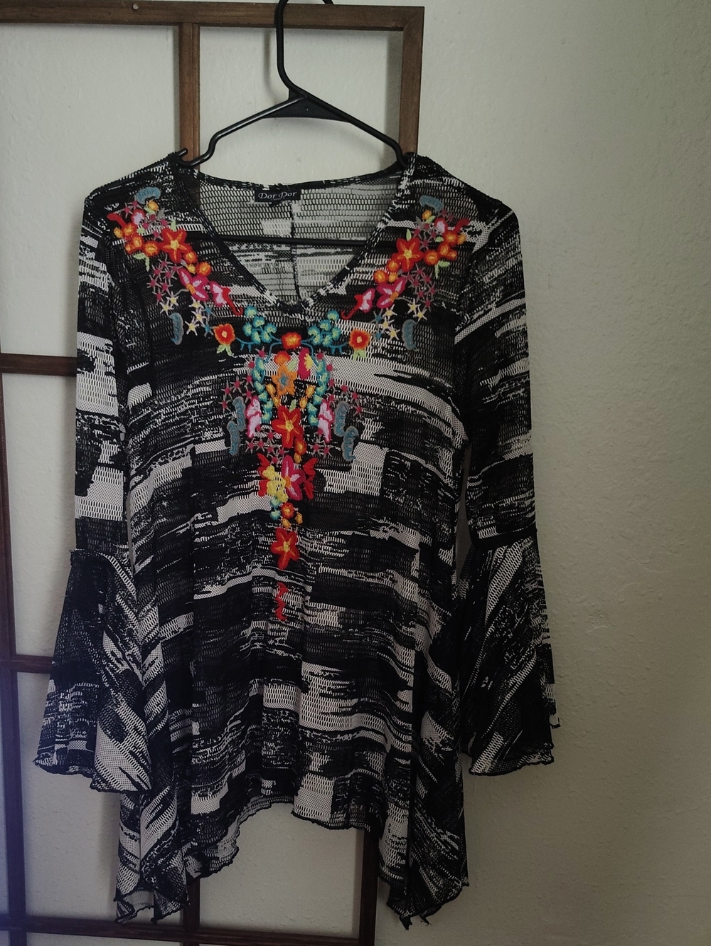 Black & White V‑Neck Tunic with Multicolor Embroidered Floral Accents